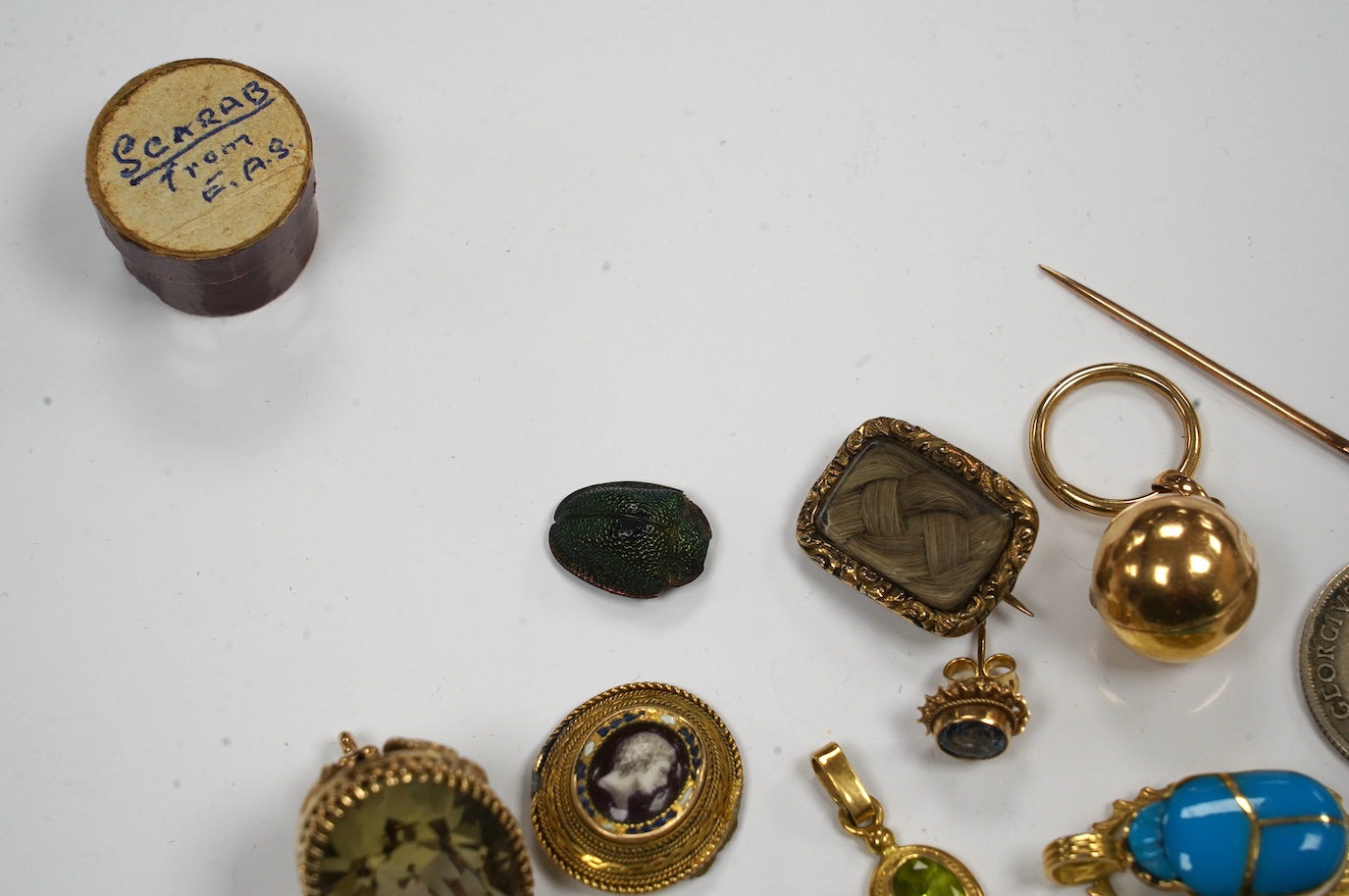 Assorted jewellery etc. including a modern 9ct gold and citrine fob, Victorian mourning brooch and a scarab beetle. Condition - poor to fair